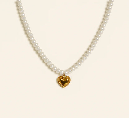Classic pearls, heartfelt charm Necklace