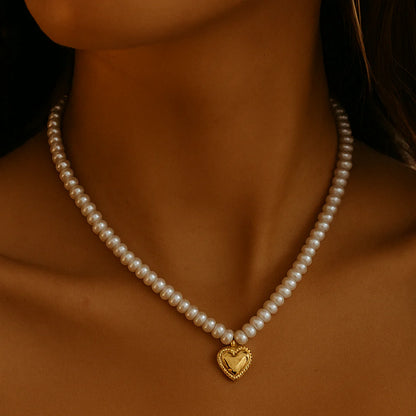 Classic pearls, heartfelt charm Necklace